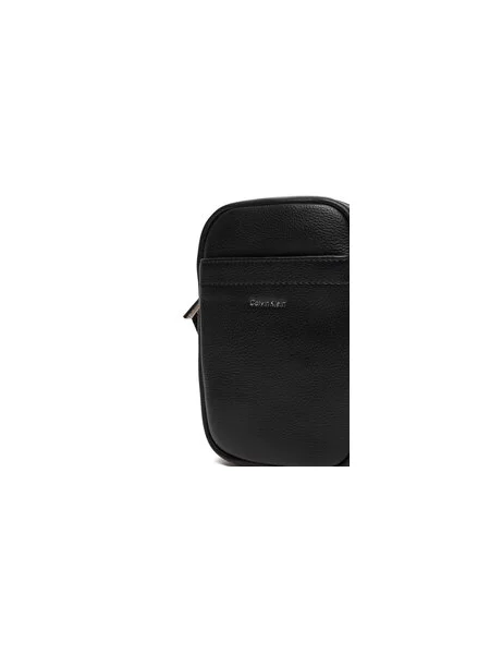 Calvin Klein Torbica za okrog pasu Raised Slim Reporter črna