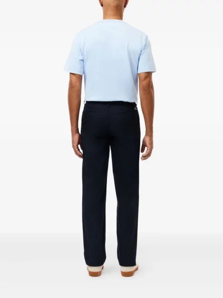 Pantaloni Lacoste cu broderie albastru