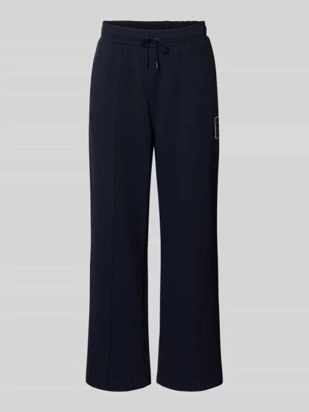 Spodnie dresowe w kroju loose fit z mieszanka bawełny model Tenn' Lacoste