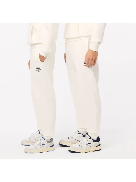 Lacoste Spodnie Dresowe Ze Zwężanymi Nogawkami niebieskie