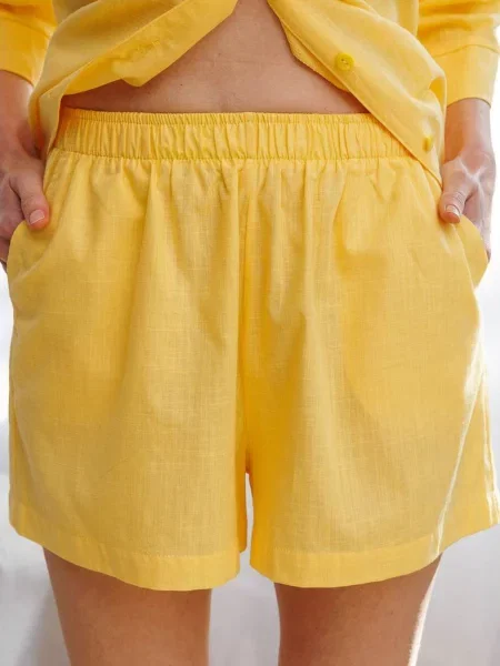 Женские шорты жовті