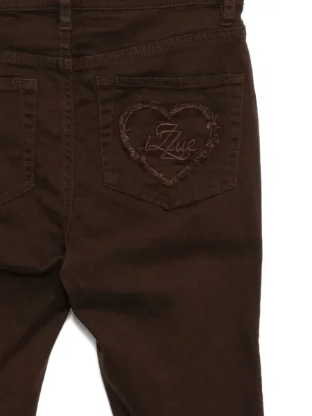Jeansy Izzue w serca brązowe