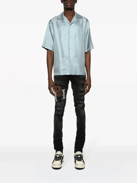 Skinny jeansy skinny Amiri z przetarciami