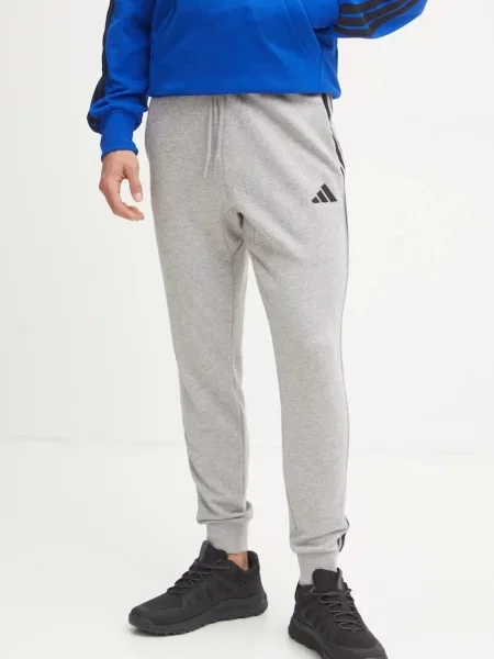 Tepláky adidas Essentials melanžové šedá