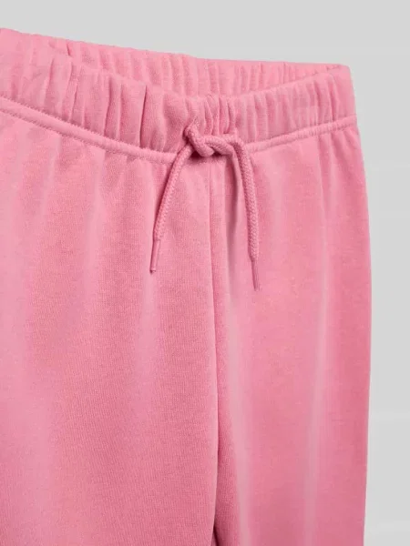 Spodnie dresowe o kroju regular fit z mieszanki bawełny Only różowe