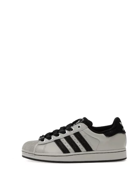 Sneakerși Adidas Copa cu dungi din piele negru