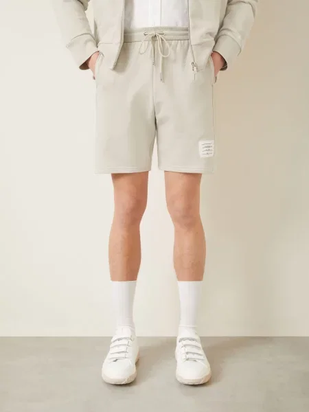 Thom Browne. Szorty Dresowe beige białe