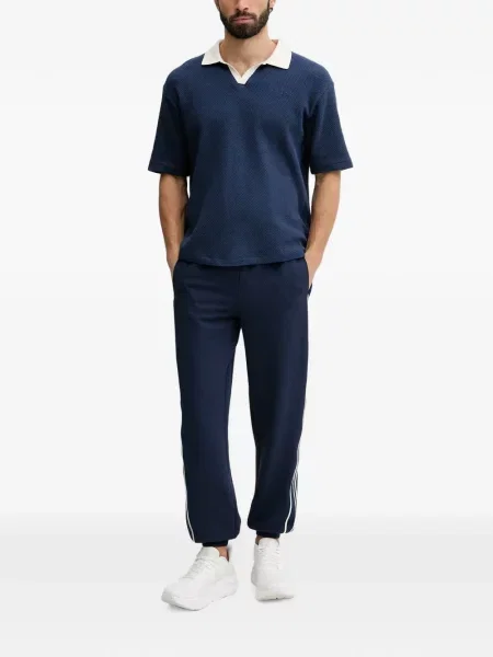 Pantaloni Guess cu dungi alergare albastru