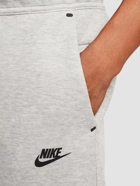 Флисовые джоггеры Nike серые