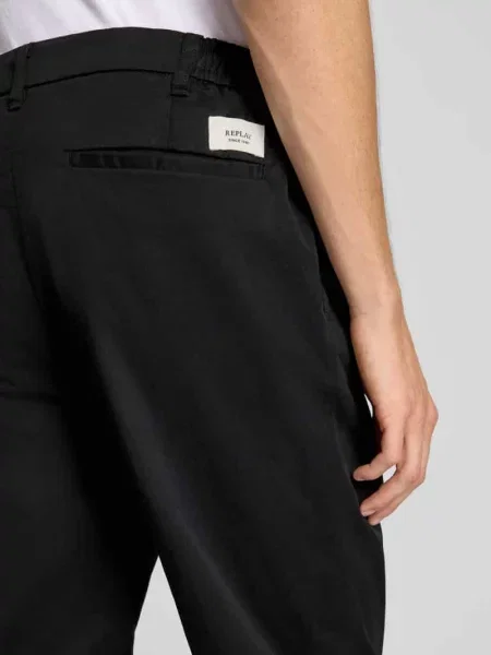 Chinosy o kroju tapered fit z wpuszczanymi model ‘ADHANN’ Replay czarne