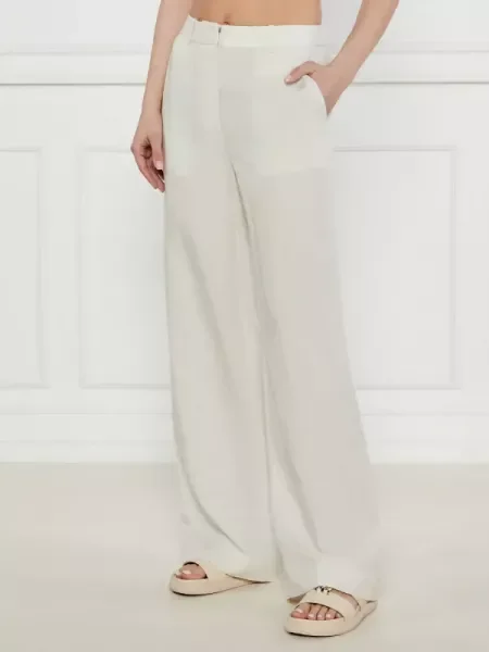 Calvin Klein Nadrág | flare fit len hozzáadásával bézs