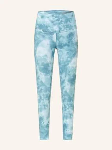 Nike Legginsy Zenvy gruen białe