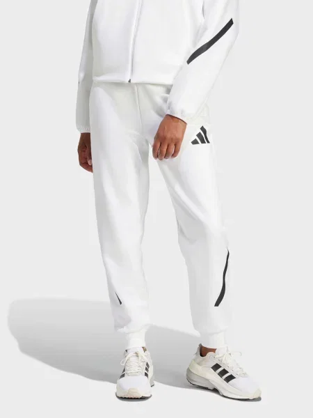 Джогери adidas Z.N.E. SPORTSWEAR перероблений поліестер/бавовна білий
