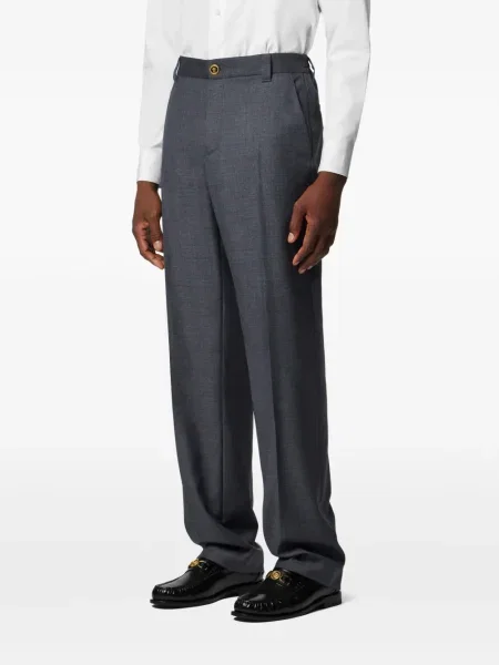 Pantaloni Versace de lână în carouri gri
