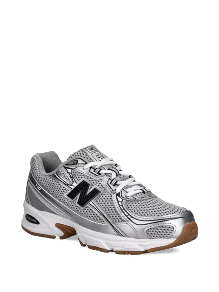 Nėriniuotos sportbačiai New Balance su raišteliais pilka
