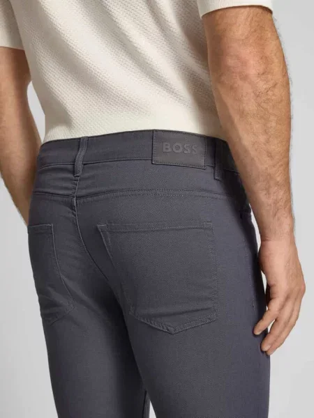 Spodnie materiałowe o kroju slim fit z mieszanki bawełny model ‘DELAWARE’ Boss granatowe