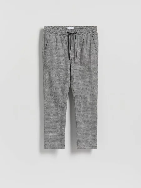 Клетчатые брюки Reserved серые