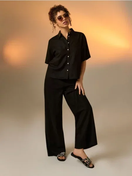 Тапочки Sinsay с принтом с принтом зебра черные