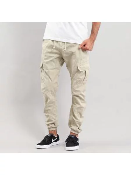 Běžecké tepláky Urban Classics béžové