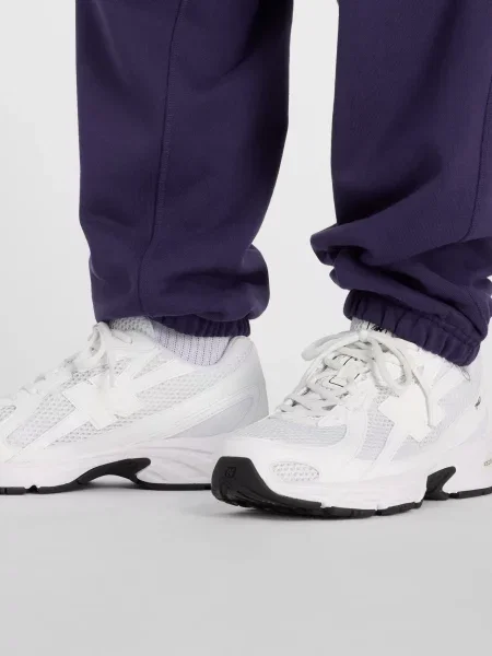 Махровые джоггеры New Balance фиолетовые