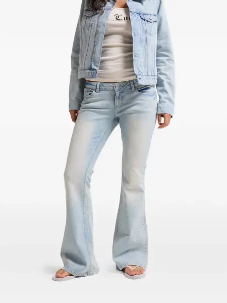 Džínsy so strihom ku čižmám Juicy Couture modrá