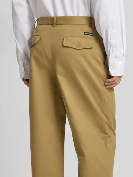 Spodnie materiałowe o kroju relaxed fit z bawełny Maison Kitsune beżowe
