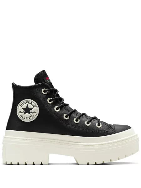 Iš natūralios odos sportbačiai Converse Chuck 70 izoliuoti ant pleištinio kulniuko pilka