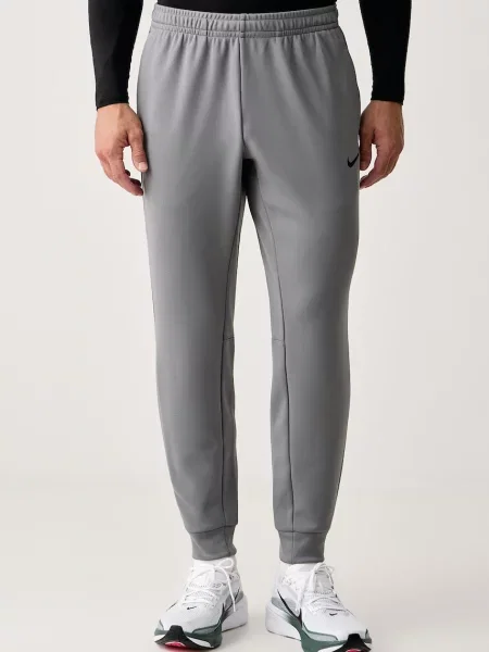 Nike spodnie treningowe Hyverse UV Dri-FIT szare
