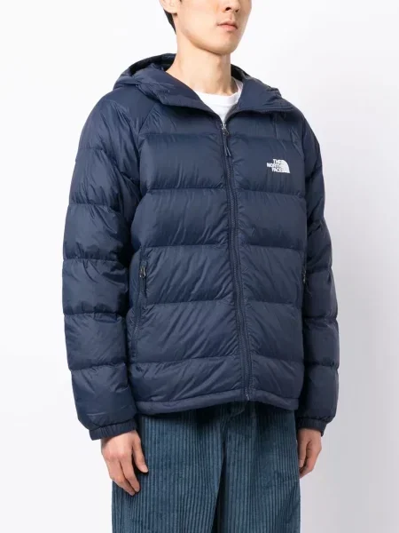 Geacă The North Face cu glugă albastru