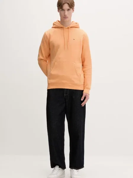 Tommy Jeans pulover s kapuco z bombažem oranžna