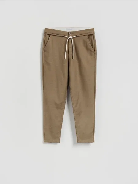 Reserved Spodnie carrot z wiązaniem beżowy