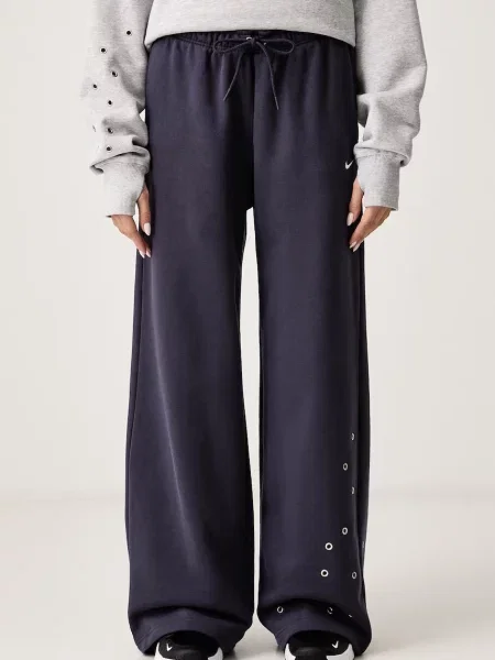 Nike Sportswear spodnie dresowe z bawełną Studio Fleece niebieskie
