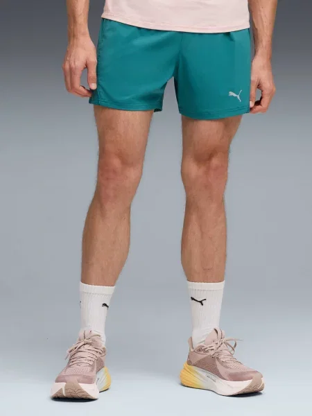 Короткие спортивные шорты Puma для бега зеленые