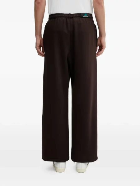 Sneakersy Adidas Predator w paski z dekoltem w serek z kapturem różowe