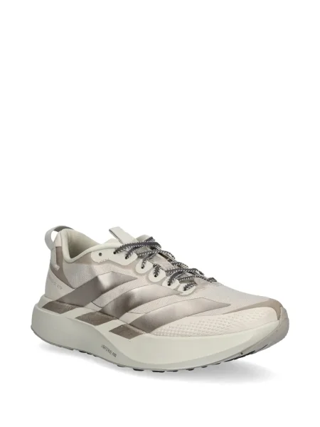 Sneakersy Adidas Predator w paski z dekoltem w serek z kapturem różowe