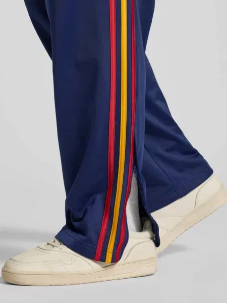 Spodnie dresowe w kroju regular fit z kontrastowymi lampasami model FIREBIRD' Adidas Originals
