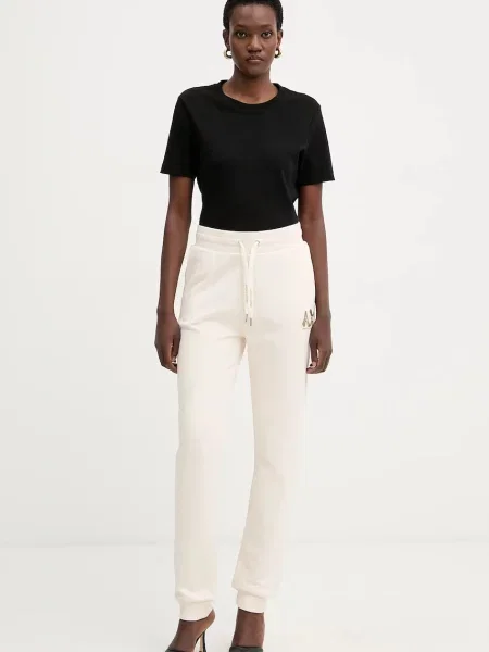 Спортивні штани Armani Exchange з аплікацією бежевий