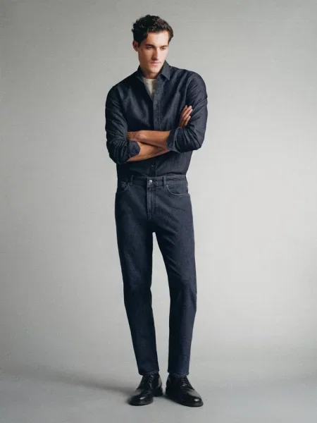 Jeansy wyprodukowane we Włoszech fason tapered tkanina Candiani black denim Mężczyzna 44 MANGO MAN czarny