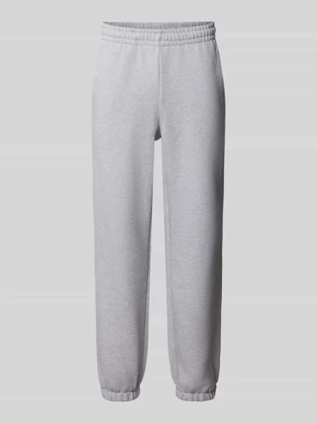 Spodnie dresowe o kroju regular fit z mieszanka bawełny Lacoste