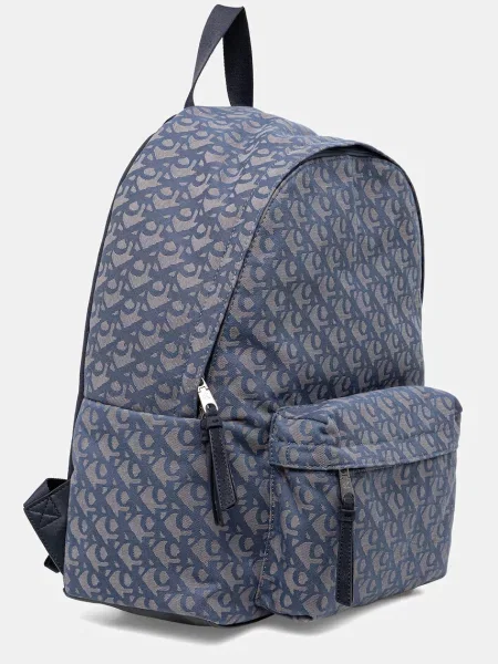 Calvin Klein Jeans Ruksak Unstructured Monogram Backpack 4 Modrá sivá