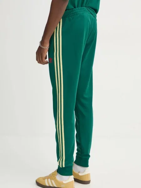 Adidas Originals spodnie dresowe SST TP z aplikacją zielony