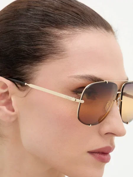 Солнцезащитные очки Chloé золотые