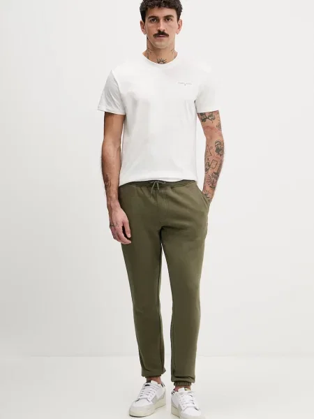 Tepláky Tommy Jeans zelená