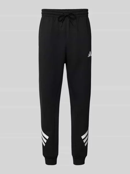 Spodnie dresowe z elastycznym pasem i logo Adidas Sportswear czarny