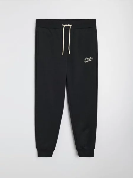 Sinsay Kalhoty Jogger slim fit černá