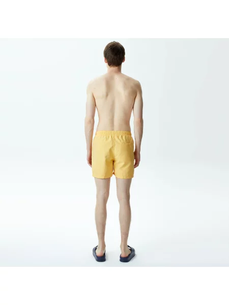 Шорты Lacoste желтые