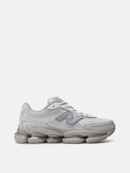 Повседневные кроссовки New Balance с сеткой в сеточку серые