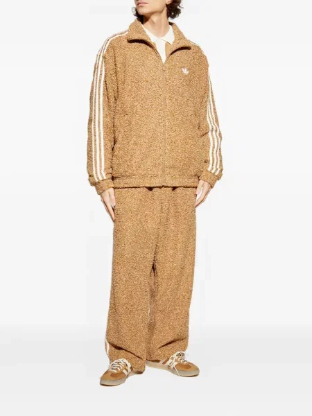 Prugasti prsluk Adidas od flisa s vezicama crvena