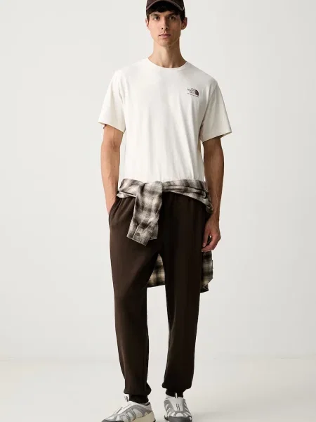 The North Face pantaloni de trening pentru bărbați cu Evolution maro