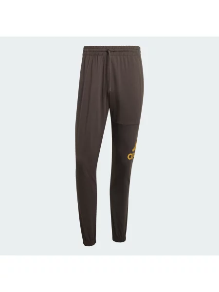 Zúžené kalhoty jogger Adidas jersey šedé